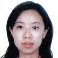 Head shot of Asian woman with long black hair.