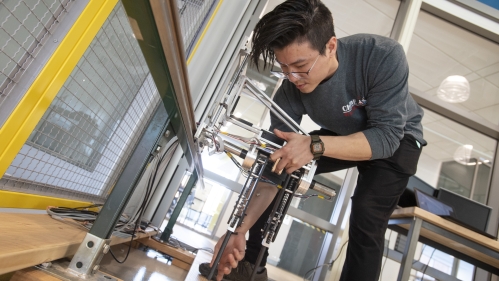 Jerry Wu (SOE '20) works in the Robotics Lab in Weeks Hall