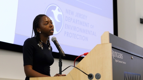 Urban Engineering Symposium Speaker at podium