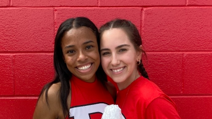 Two smiling female students