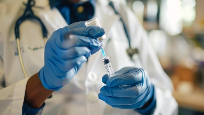 Healthcare Professional Prepares Medication with Meticulous Accuracy