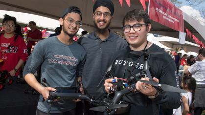 Three students and a drone at Rutgers Day