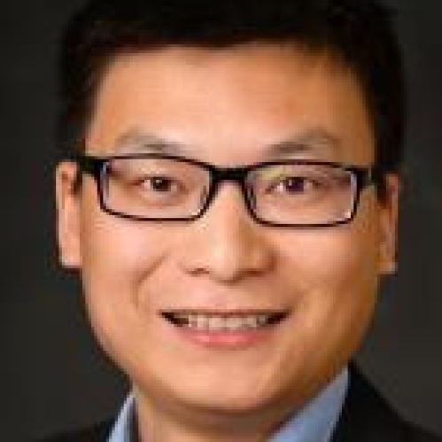Headshot of Chinese male with short, black hair, wearing eyeglasses.