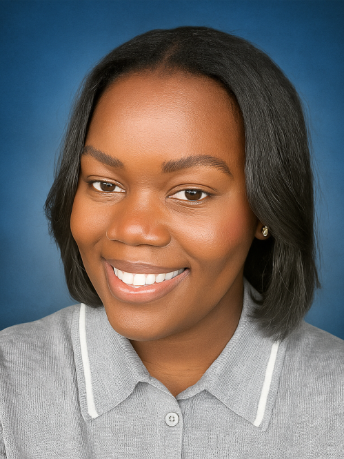 Headshot of Black woman with short black hair wearing a grey polo shirt.