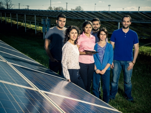 students working in solar farm