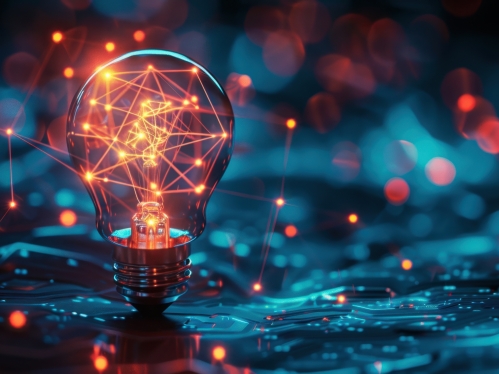 Graphic with lit lightbulb and blue abstract electronics.