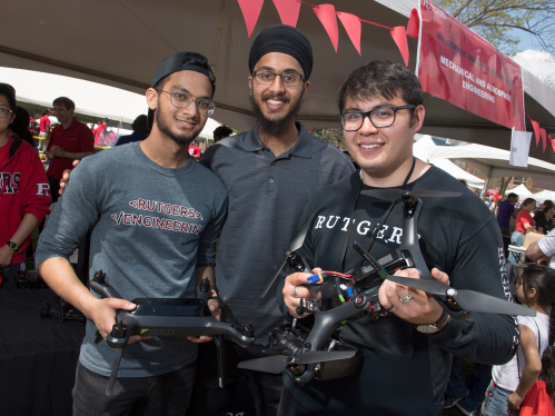 Three students and a drone at Rutgers Day