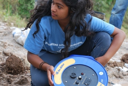 Female student working in Kenya with Engineers Without Borders