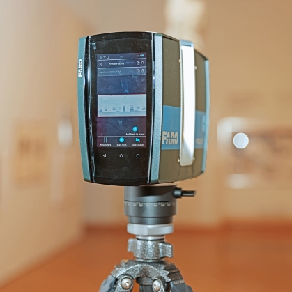 A light detection and ranging scanner to capture panoramic, high color resolution 3D imaging.  