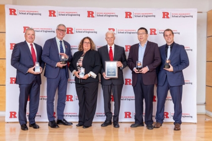 Six Medal of Excellence honorees holding awards.